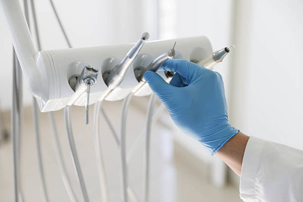 Professional Tooth Extraction technician working in Elwood, UT